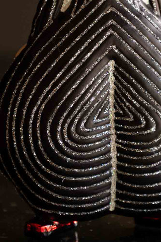 Detail shot of the trousers on the Stripe Bowie Inspired Christmas Tree Decoration.