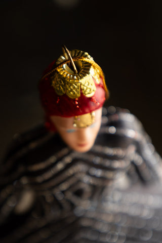 Detail shot of the top of the Stripe Bowie Inspired Christmas Tree Decoration.