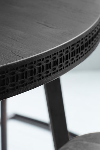 Close-up of the edge of the Stylish Mango Wood Round Dining Table.