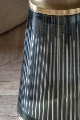 Close-up of the base of the Blue Tapered Glass & Marble Side Table.