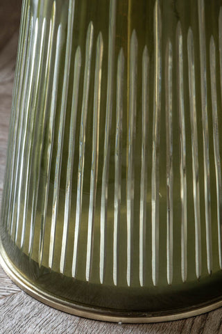 Close-up of the base of the Green Tapered Glass & Marble Side Table.