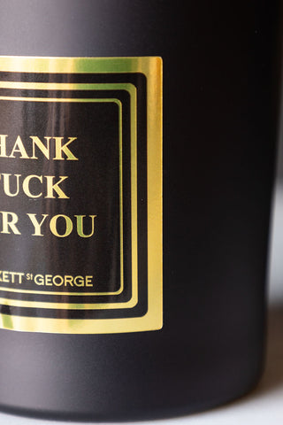 Detail shot of the design on the Thank Fuck For You Scented Candle.