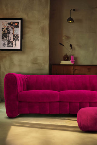 The Bowie Large Sofa In Luxe Kneedlecord Velvet Harry's Pink styled in a living room with a footstool.