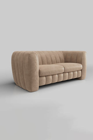 The Bowie Large Sofa In Luxe Kneedlecord Velvet Natural Whisper on a plain background, seen from a side angle.