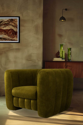 The Bowie Love Seat In Luxe Kneedlecord Velvet Vintage Green styled in a living room.