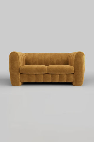 The Bowie Medium Sofa In Luxe Kneedlecord Velvet Golden Glow on a plain background, seen from the front.