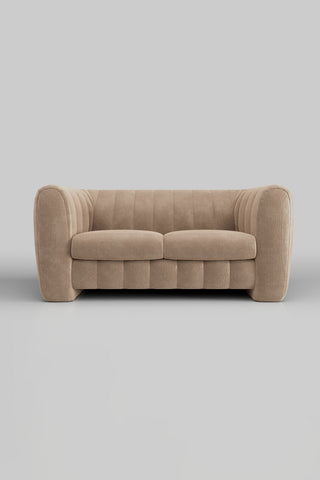 The Bowie Medium Sofa In Luxe Kneedlecord Velvet Natural Whisper seen from the front, on a plain background.