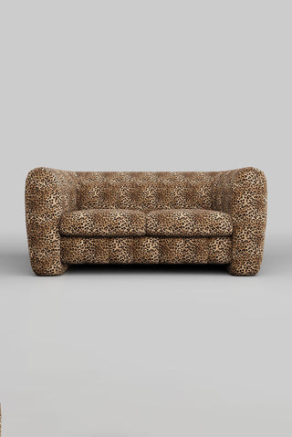 The Bowie Medium Sofa In Leopard Love Velvet Natural on a plain background, seen from the front.