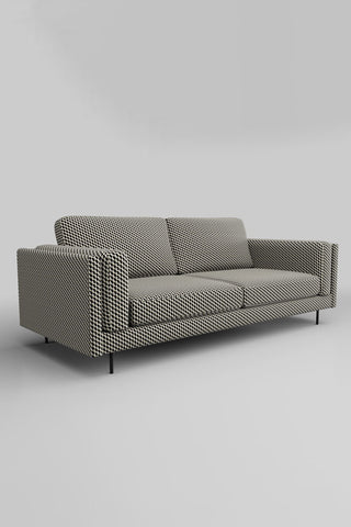 The Grace Large Sofa In Geo Glam Woven Sand & Black on a plain background, seen from a side angle.