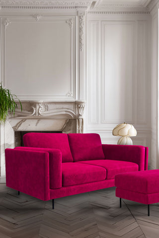 The Grace Large Sofa In Luxe Kneedlecord Velvet Harry's Pink styled in a white panelled living room with a footstool