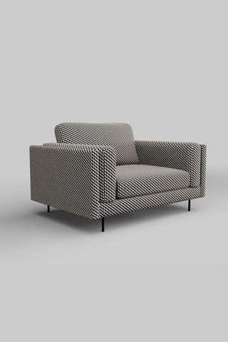 The Grace Love Seat In Geo Glam Woven Sand & Black on a plain background, seen from a side angle.