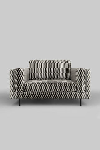 The Grace Love Seat In Geo Glam Woven Sand & Black on a plain background.