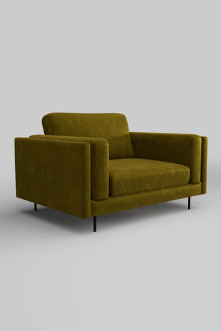 The Grace Love Seat In Luxe Kneedlecord Velvet Vintage Green on a plain background, seen from a side angle.