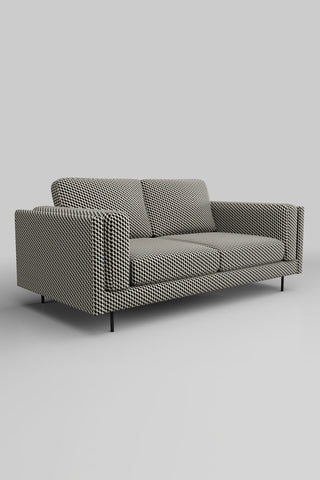 The Grace Medium Sofa In Geo Glam Woven Sand & Black on a plain background, seen from a side angle.