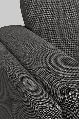 Detail shot of the fabric of The Grace Medium Sofa In Timeless Texture Black Bean.