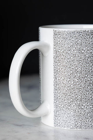 Detail shot of the handle of The Micro Penis Mug.