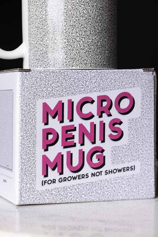 Close-up of The Micro Penis Mug box, with the mug displayed on top.