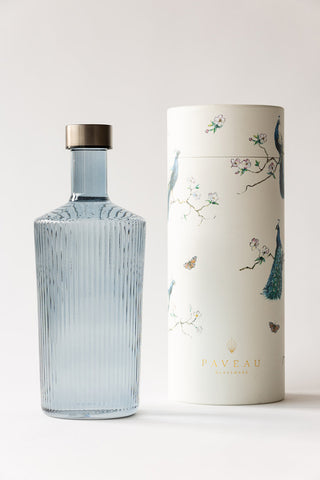 The Paveau - Gorgeous Ribbed Glass Carafe in Grey Blue styled with its box.