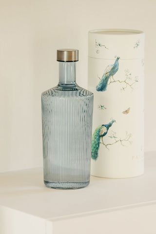 The Paveau - Gorgeous Ribbed Glass Carafe in Grey Blue styled with the accompanying box.