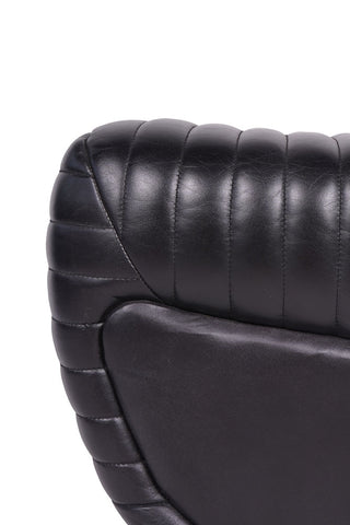 Detail shot of the Traditional Charcoal Leather Occasional Chair on a white background.