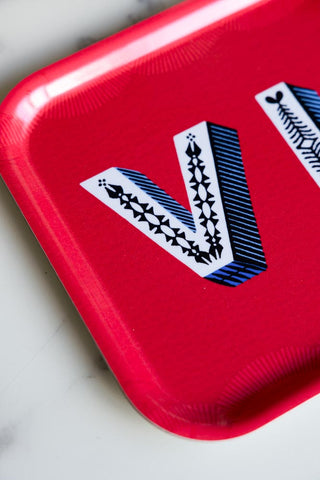 Detail shot of the text on the VIP Red Tray.
