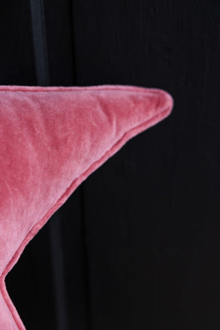 Close-up of the Velvet Star Cushion In Hot Pink.