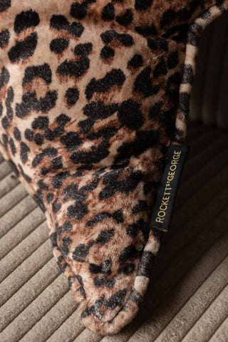 Close-up of the Velvet Star Cushion In Leopard Print with the Rockett St George logo.