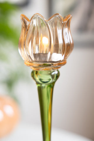 Close-up of the flower of the Vintage-Style Orange Glass Flower Candle Holder.