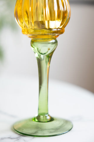 Close-up of the stem of the Vintage-Style Yellow Glass Flower Candle Holder.