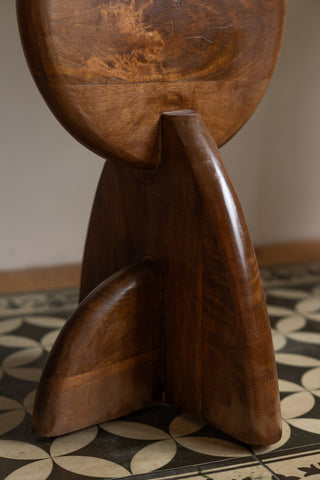 Close-up of the base of the Warm Brown Mango Wood Side Table.