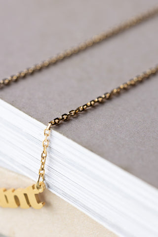 Close-up of the chain of the Waterproof Gold Cunt Necklace.