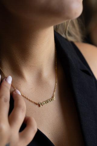 The Waterproof Gold Femme Necklace styled on a model.