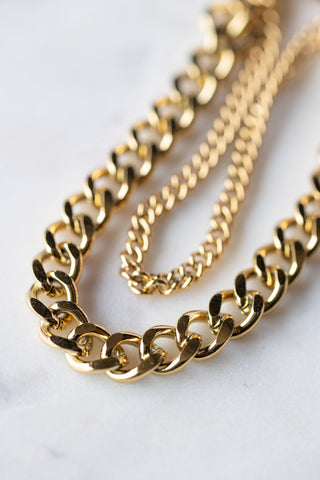 Close-up of the chain of the Waterproof Wink Face Gold Chain Bracelet.