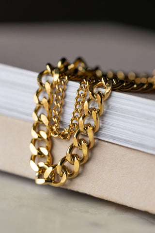 Detail shot of the chain of the Waterproof Wink Face Gold Chain Bracelet.