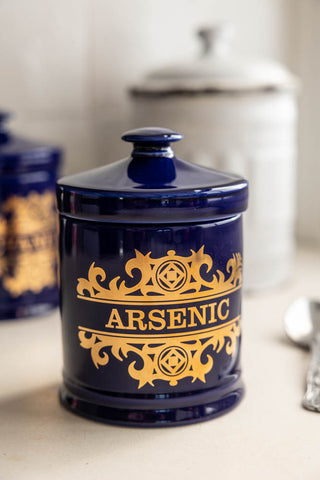 Close-up of the What's Your Poison - Arsenic Jar styled on a white kitchen backdrop.