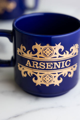 Close-up showing the lettering on the What's Your Poison - Arsenic Mug.