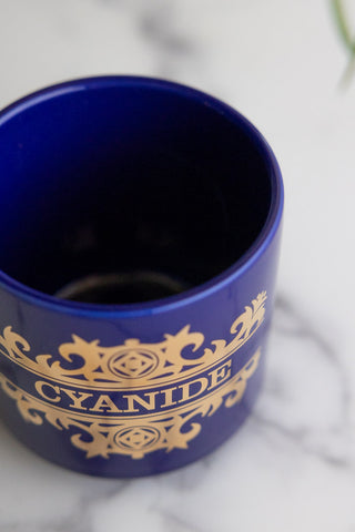 A detail shot showing the brim of the What's Your Poison - Cyanide Mug.