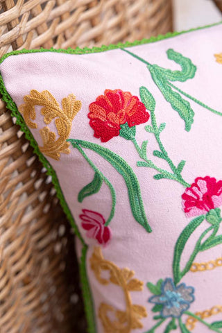 Close-up of the corner of the Wild Embroidered Cushion.