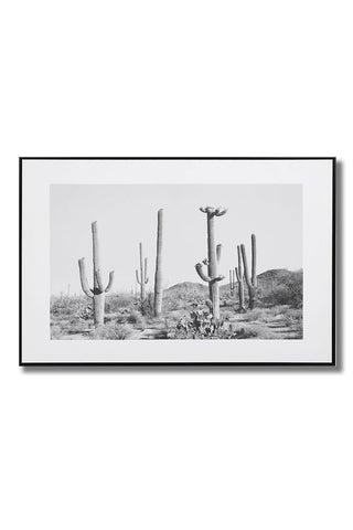 Cutout of the Wild West Cactus Art Print on a white background, with a shadow.