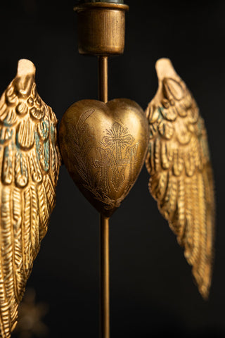 Close-up of the heart on the Winged Milagro Heart Candle Holder.