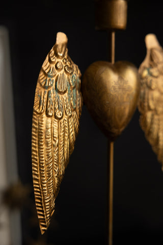 Detail shot of one of the wings on the Winged Milagro Heart Candle Holder.