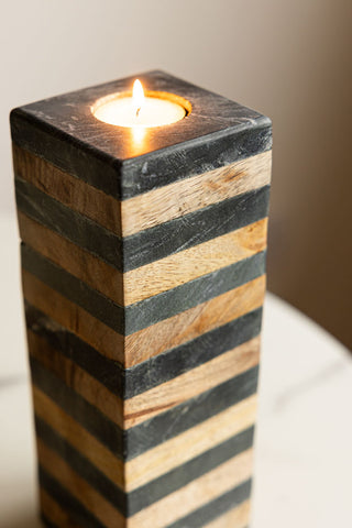 Close-up of top of the Wood & Slate Tealight Holder with a lit tealight inside.