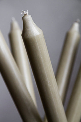 Close-up image of Sage Green Beautiful Dinner Candles in a jar