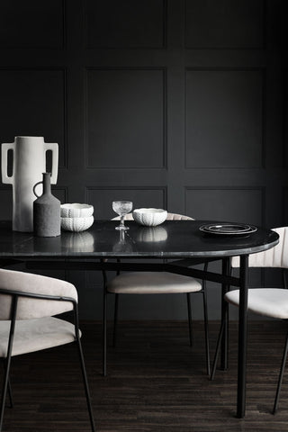 Lifestyle image of the Black Marble Dining Table