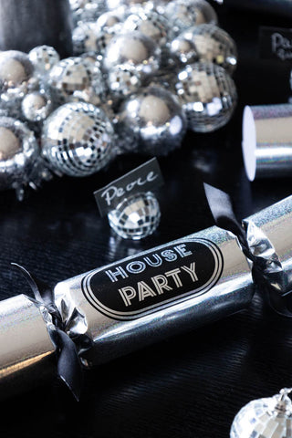 Close up on the silver 'house party' christmas cracker.