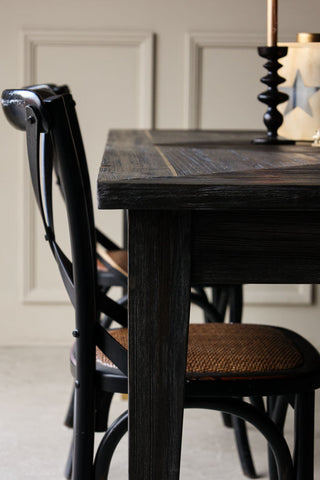 Image of the edge of the Elm & Brass Dining Table