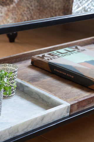 Close-up of the bottom marble & wood tray shelf on the Multi-Tray Marble & Mango Wood Coffee Table