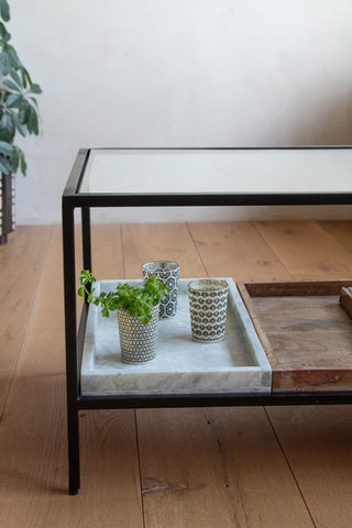 Close-up image of the left side of the Multi-Tray Marble & Mango Wood Coffee Table