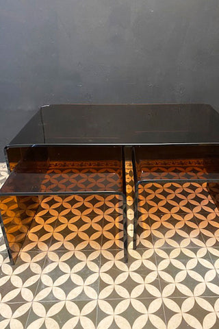 Side on view of the amber coffee tables