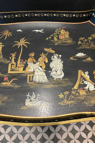 Detail view of the chinoiserie patterns on the Chinoiserie tray table.